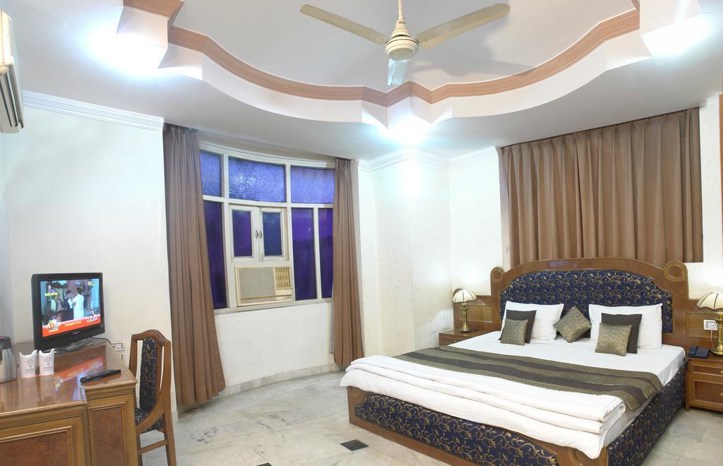 A New Delhi Hotel Orchid Garden Rum bild